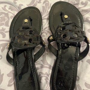 Tory Burch Black patented leather Sandals with Medallion